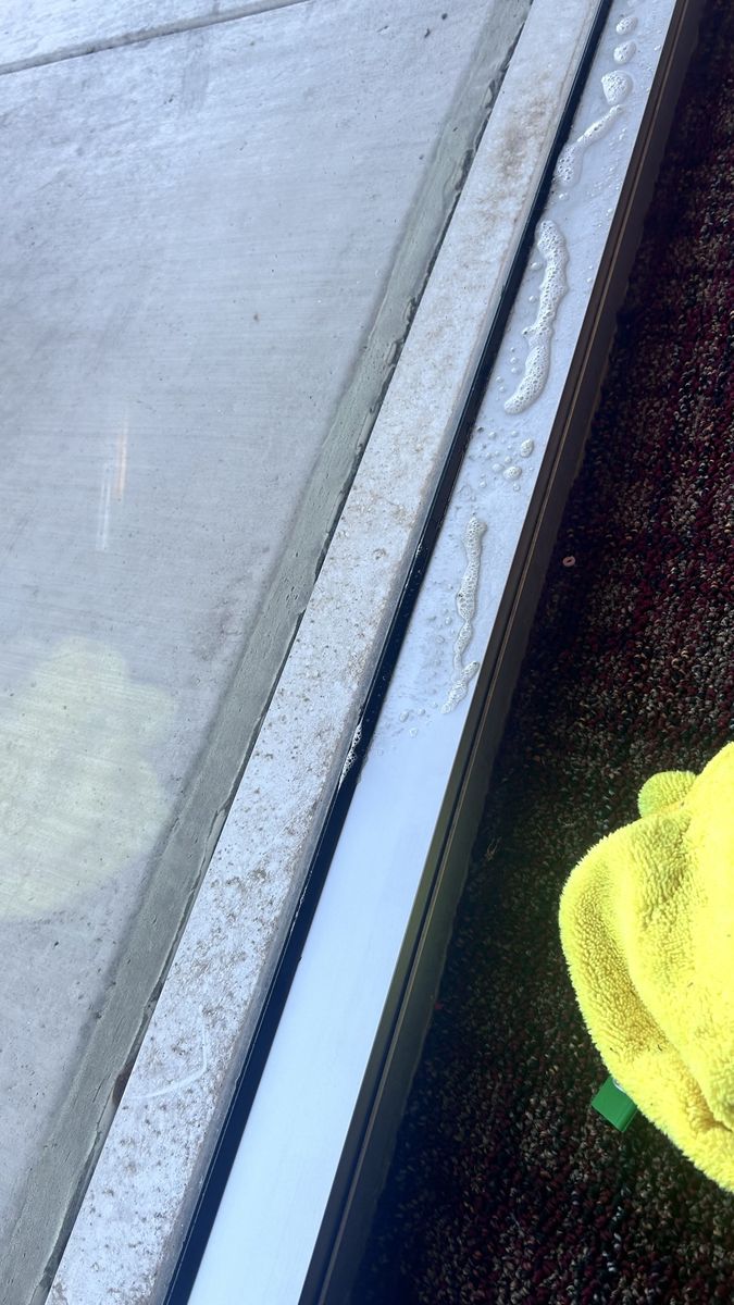 Filthy window track before cleaning